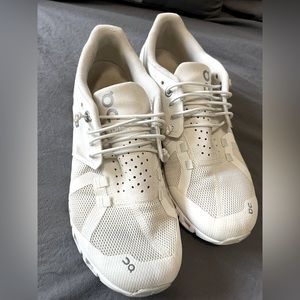 Women’s size 7 white on cloud shoes. Barely worn great condition.